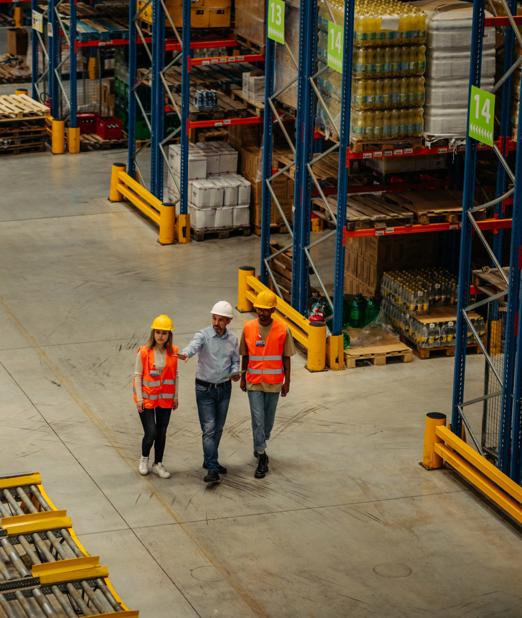 warehouse coworkers meeting with supervisor